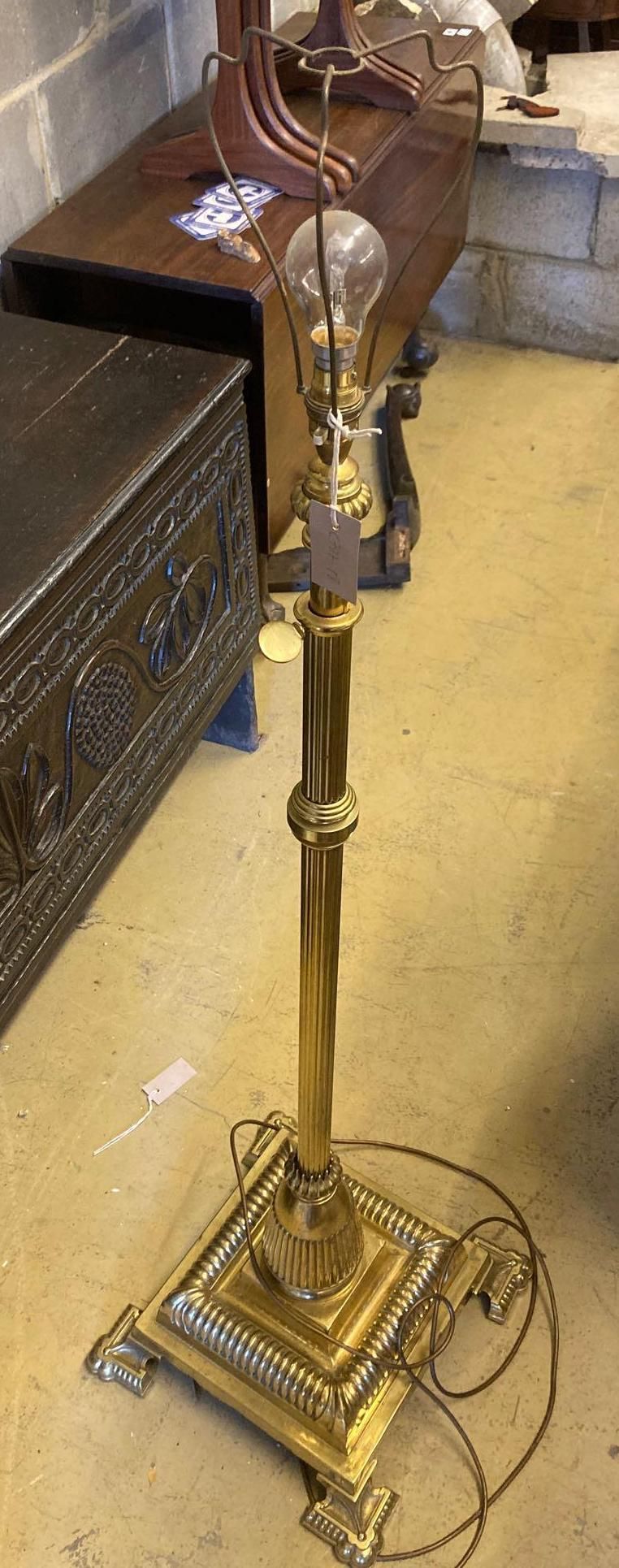 An Edwardian lacquered brass telescopic lamp standard